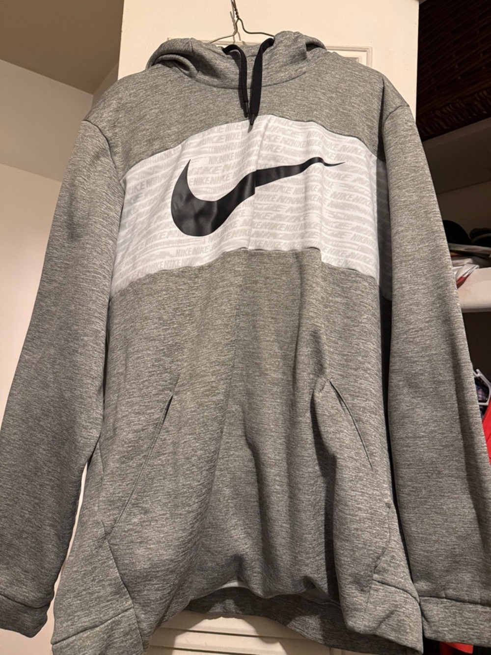 Nike Grey Hoodie with White Chest Panel and Black Swoosh